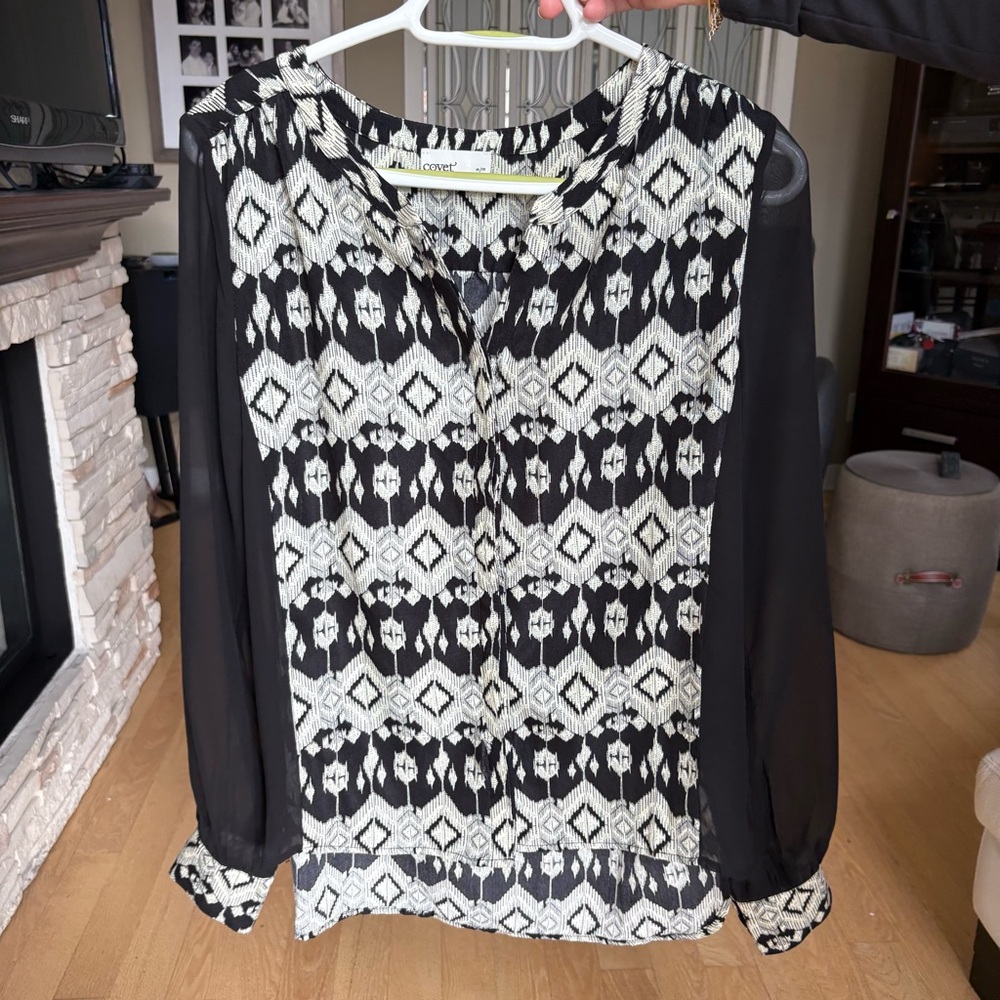 Elegant Black and Cream Geometric Blouse